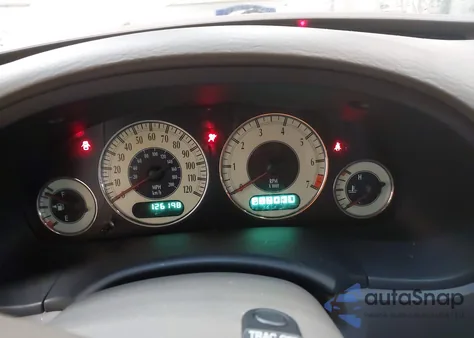 2002 Chrysler Town & Country Limited z USA, uszkodzony, nr VIN 2C8GP64L92R557904